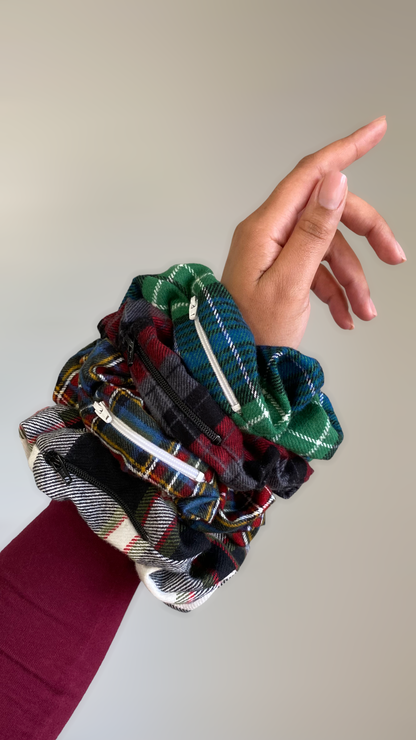 Plaid pocket scrunchies with zipper for small items.