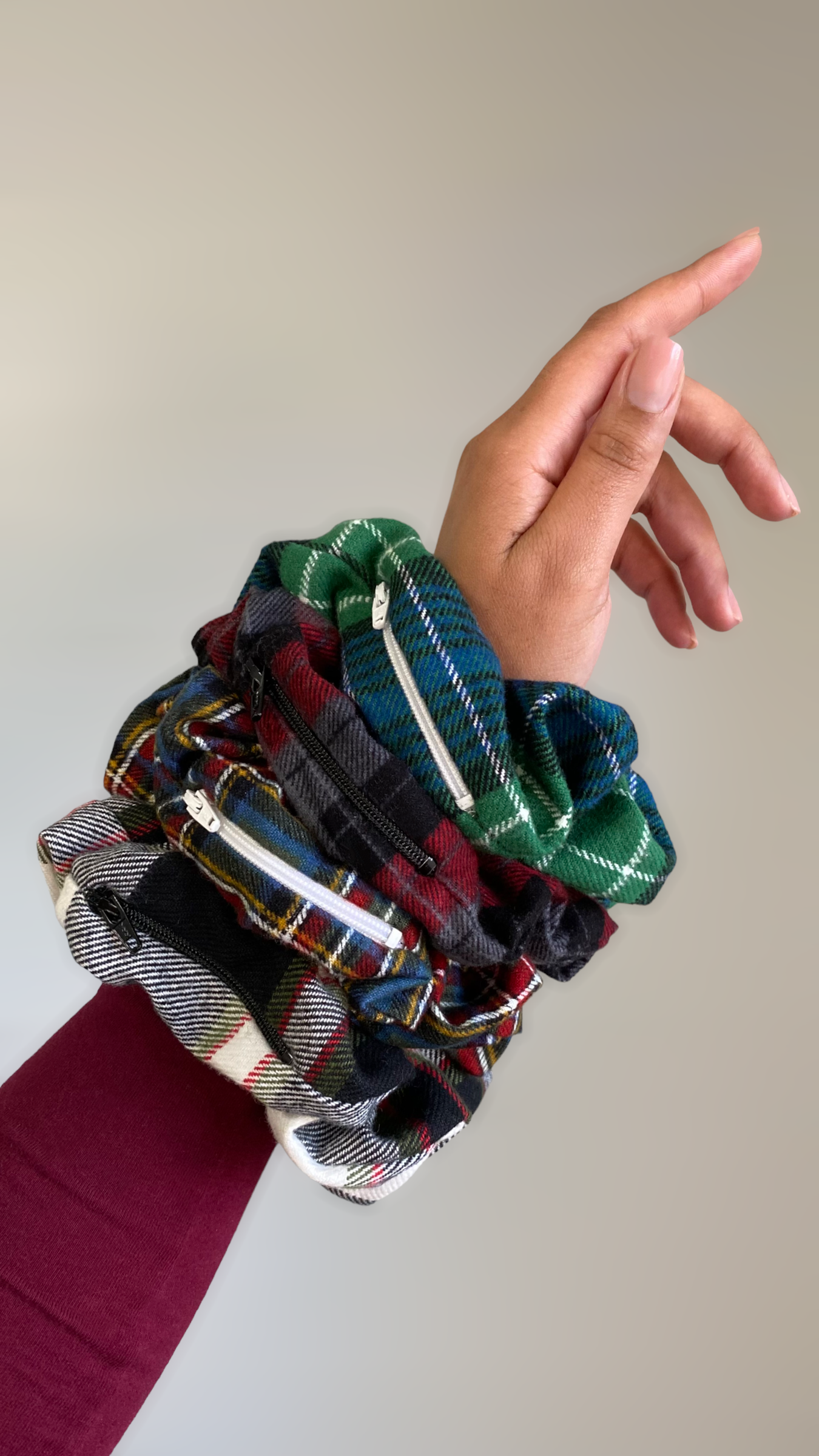 Handmade large oversized scrunchies in plaid with hidden zipper for small items.