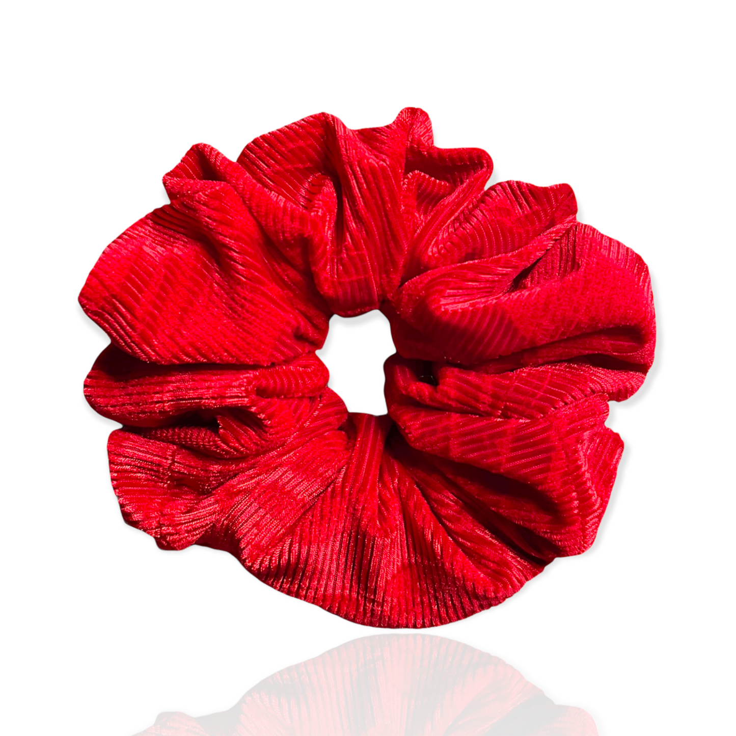 Large oversized red scrunchie with zipper for small items.