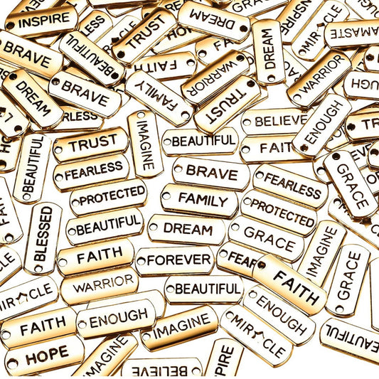 Gold affirmation charms.
