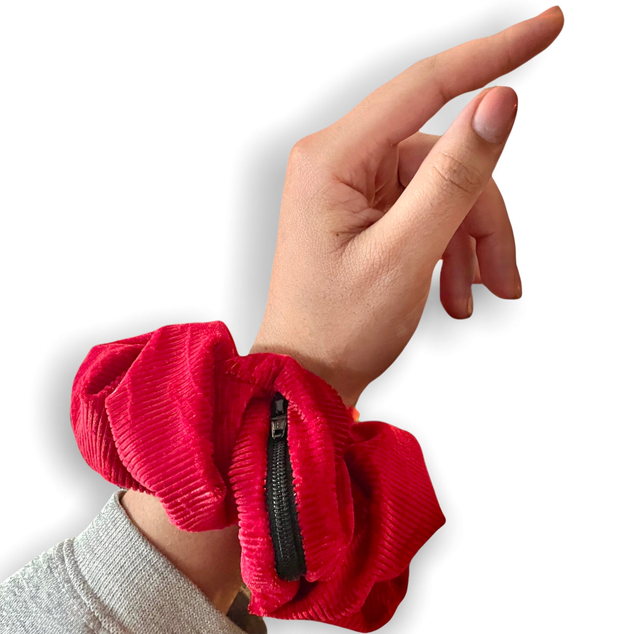 Large red scrunchie with zipper for small items.